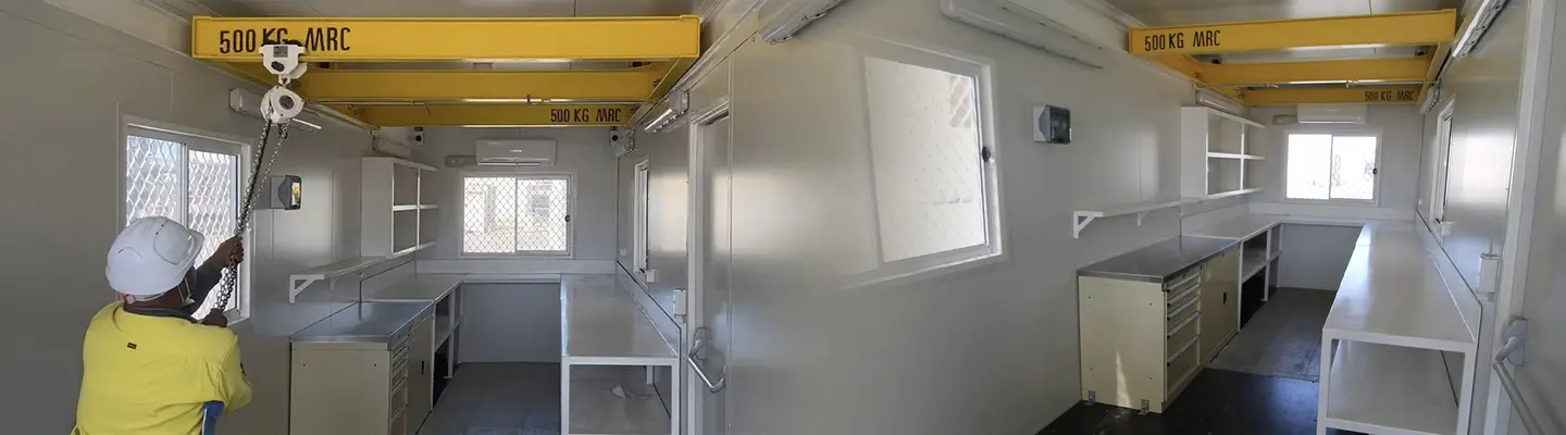 Mobile shipping container converted into a functional room, showcasing portable and modular living or work space.