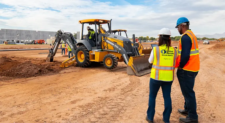 UR crew monitoring earthmoving work