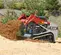 Red Takeuchi Compact Track Loader