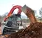 Red Takeuchi Compact Track Loader