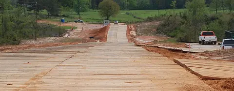 Timber mats at muddy jobsite