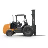 Side view of an orange rough terrain forklift with black tires and straight lifting mast with black forks extended.