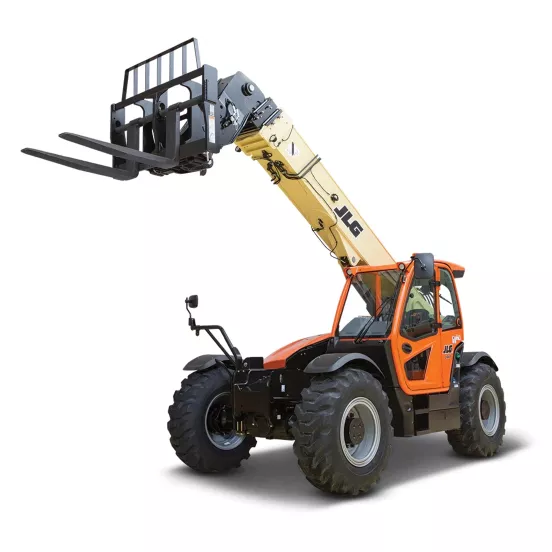 Front angled view of an orange and yellow JLG telehandler with extended boom, forklift attachment and enclosed cabin.